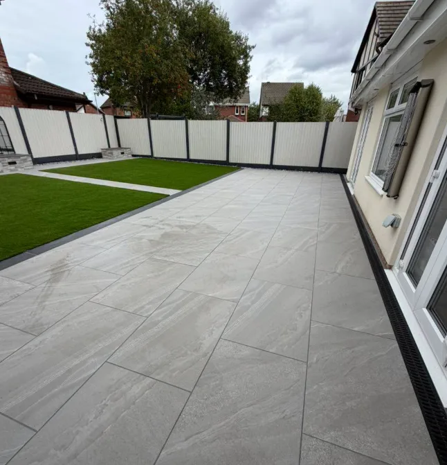 Long porcelain patio walkway alongside house
